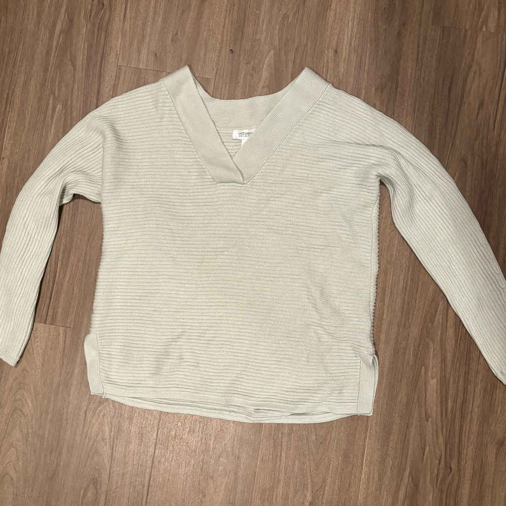 This is a soft sweater that can be paired with anything very cute not my style!